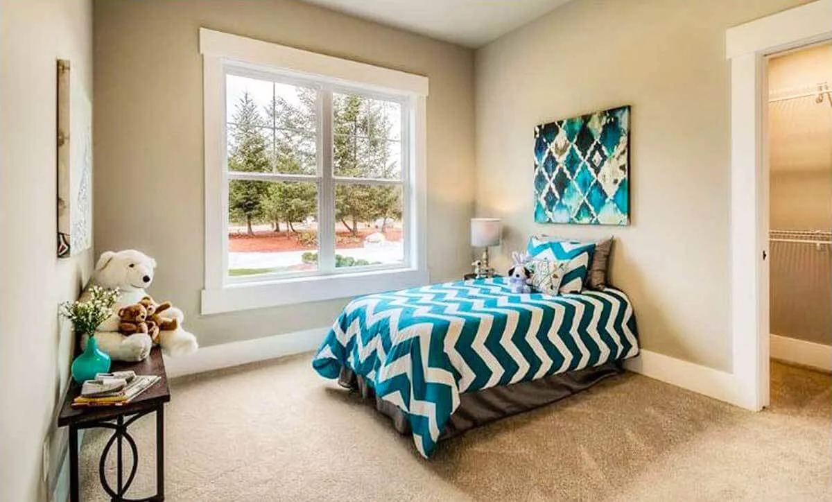 Bedroom area with enough space for personal decorations.